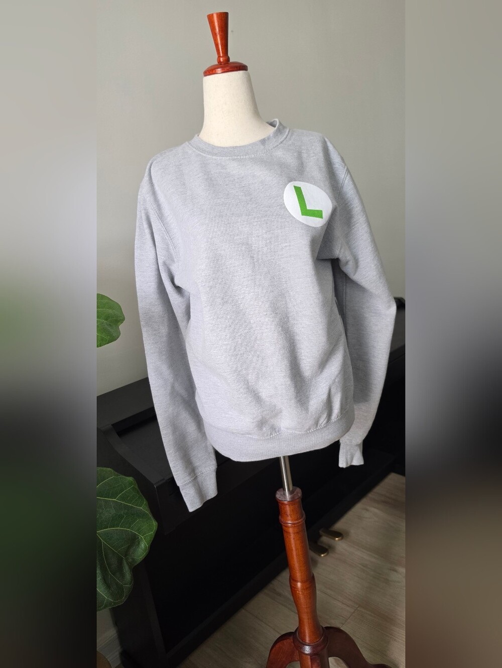 Luigi Light Gray Crewneck Sweatshirt with Green Accent "L" Universal Studios